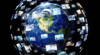 Abstract of the Planet Earth superimposed with TV screens